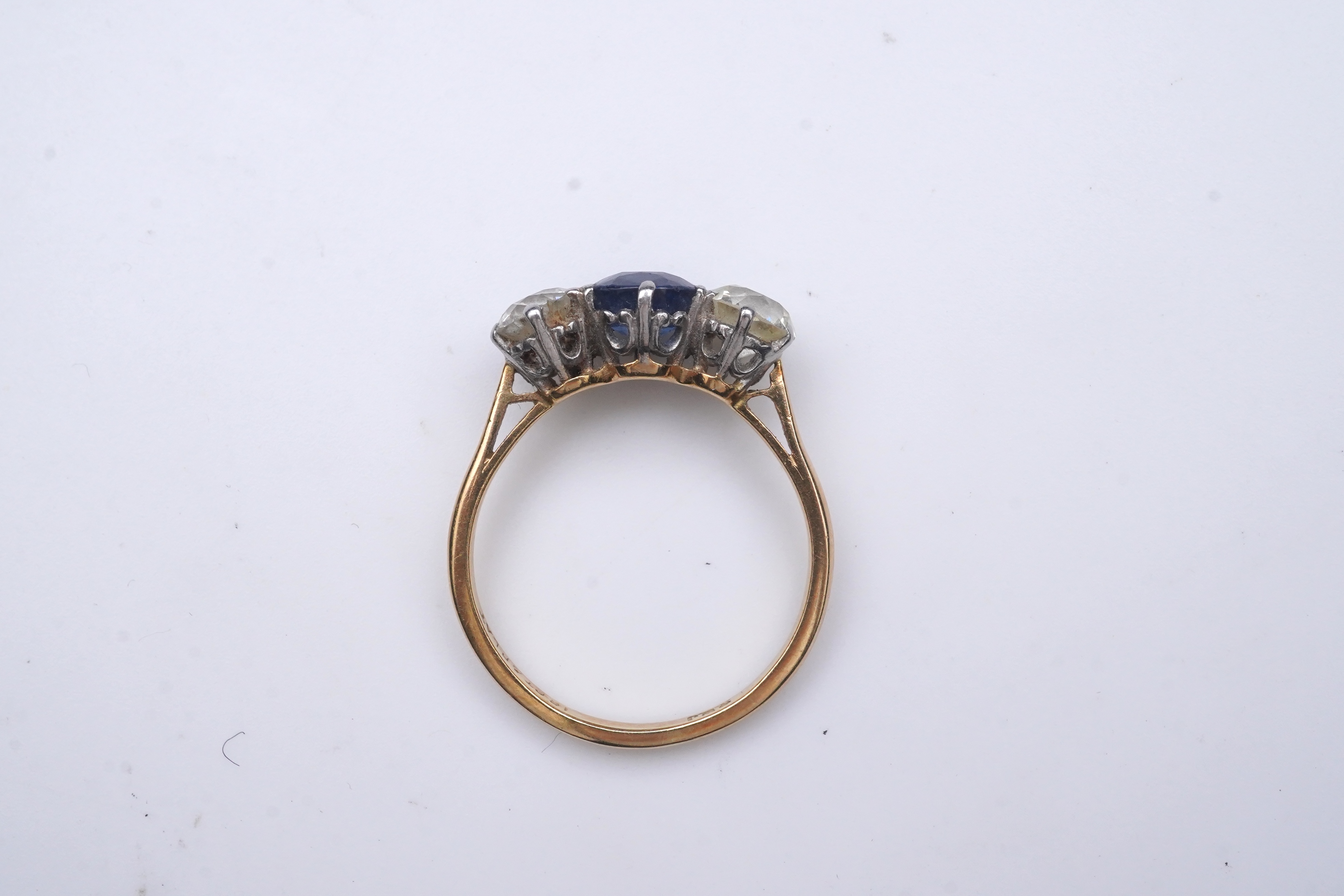 A sapphire and diamond three-stone ring, early 20th century